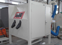 上海良時為某鑄件鑄造公司設計制造鑄件模具噴丸機/噴砂機